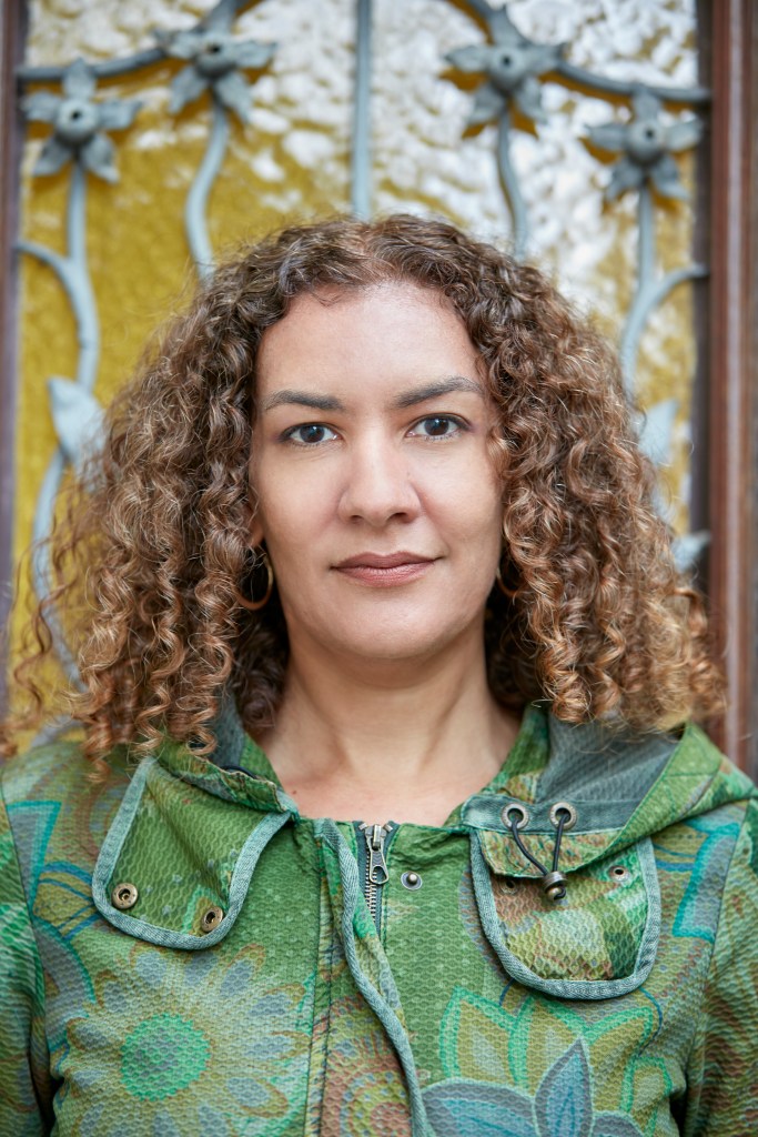 Anika Scott Author in green jacket